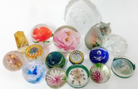 A collection of 17 paperweights, of cut glass and floral designs, together with flat pictorial