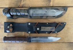 Two Ka-Kar knives both with a 17.7/8 cm long blades, to include one made by Camillus and has seen