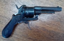 A 7mm continental pinfire revolver.