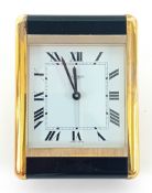 A Les Must De Cartier travelling alarm clock No. 7505 03469, the rectangular white enamel dial