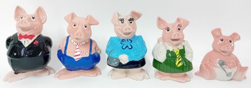 A collection of 20th century Wade for NatWest ceramic piggy banks, to include five pigs, each marked