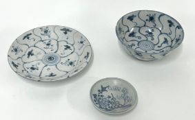 Three blue and white Tek Sing cargo items, 19th century, comprising; A bowl freely painted in the