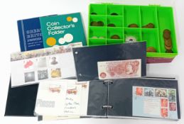 A collection of historic coins and cover albums, to include an Elizabeth II Ten Shilling Note, Great