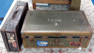 A large Second World War WWII uniform trunk, together with a leather suitcase and two metal