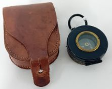 A WWI Officer's Reflector Compass, Prismatic Calcutta, in a brown leather case, maker Cooke &