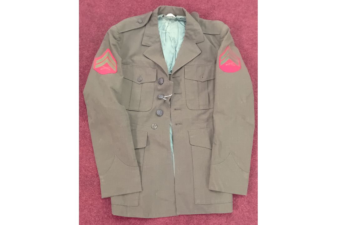 A US Marine Corps green jacket, with Marine Corps badges to arms. - Image 1 of 2
