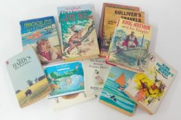 A collection of children's books, to include Penquin publications Puffin books Swallows and Amazons