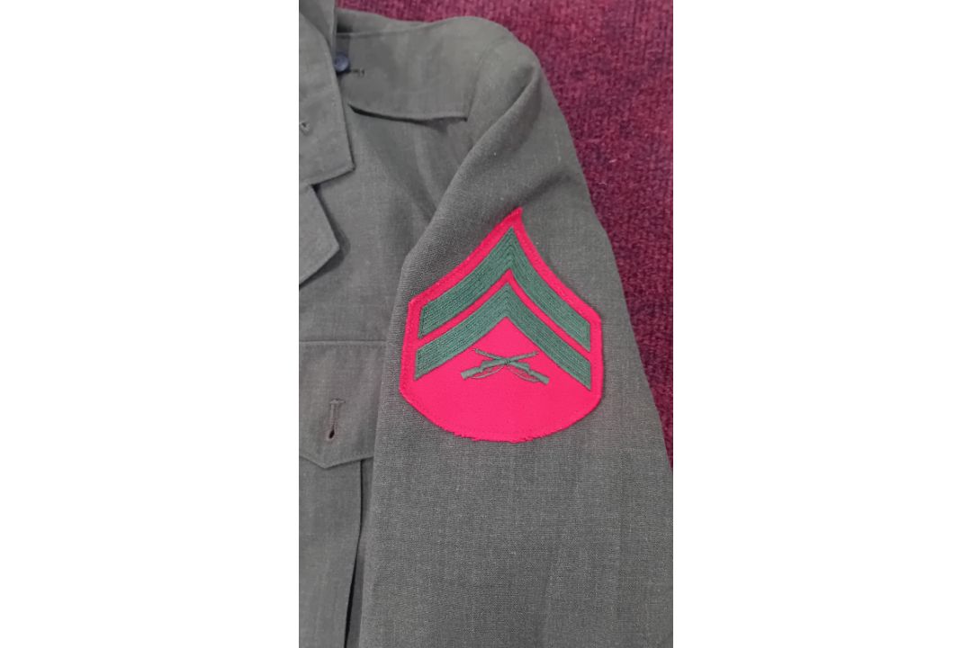 A US Marine Corps green jacket, with Marine Corps badges to arms. - Image 2 of 2