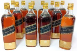 Twelve sealed bottles of Johnnie Walker Black Label Extra Special Old Scotch Whisky. (12)