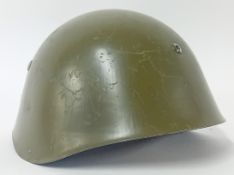 An Italian style Helmet, green painted metal.