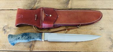 A Bark River knife, Arkansas Toothpick, blade length 23.5cm, leather scabbard. Purchaser must be