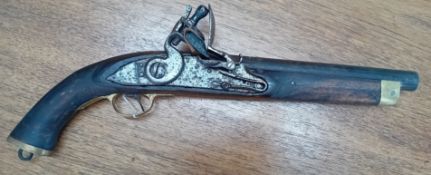 A large antique style flintlock pistol.