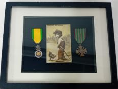 A framed WWI medal set, to include Croix de Guerre, Medaille Militaire, together with a postcard.