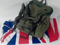A Union Jack military Ensign flag, together with a Royal Marines backpack. (2)