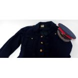A World War One WWI Royal Marine Brigadiers Cap and Blouse, of black wool, the cap with red piping