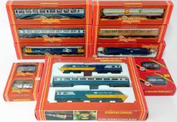 A large collection of Hornby OO-Gauge train pieces, to include four engines, various coaches, boxed,