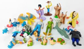 A collection of various toys mainly made for McDonald's, to include Smurfs, Toy Story, Disney