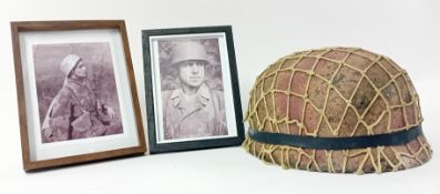 A German Helmet film prop for 'Band of Brothers', together with two framed photographs. (3)