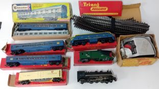 Tri-ang, a collection of OO-Gauge tracks and power, six carriages, and an engine, together with a