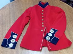 An early 20th century Royal Marine Light Infantry jacket, red wool with black collar and cuffs,
