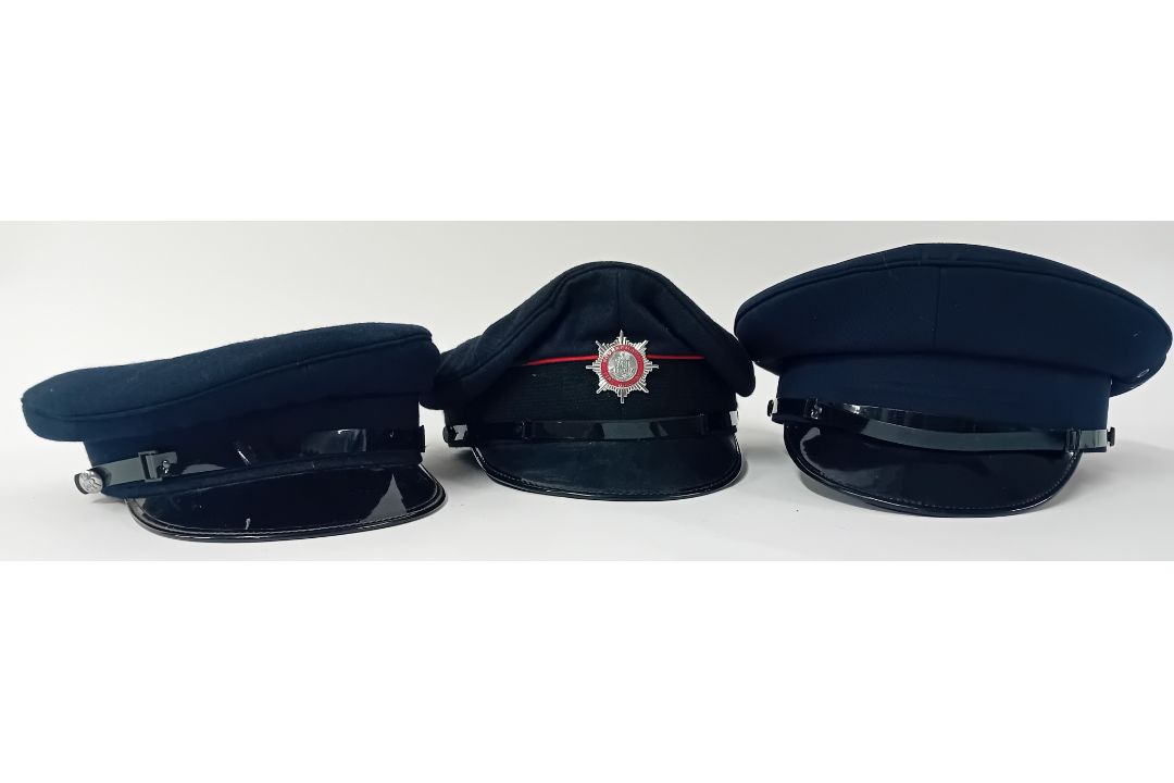 A Bournemouth Fire Cap, together with an H.M. Prison Service Cap, and a Chauffer's cap. (3)