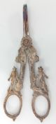 A pair of cast white metal grape scissors, probably Dutch, circa 1890, in the Rococo style, modelled