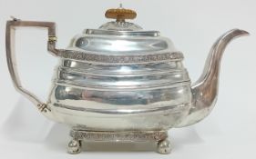 A George III silver teapot, embossed shell kings pattern decoration, hallmarked London 1810, maker