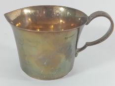 A silver mug, hallmarked London 1935, total weight approx 4.2oz.