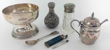 A small collection of silver, to include spoon, mustard pot, vial, glass bottle, together with