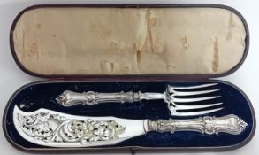 A Victorian fish slice and fork, cased, embossed and pierced foliate design, hallmarked Sheffield,