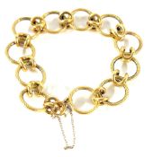 An 18ct gold bracelet, approx 13.6g.
