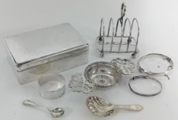 A collection of silver items, to include cigarette box with wooden interior, tea strainer, 2