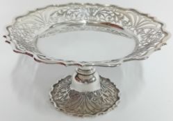 A silver raised serving dish, pierced foliate rim and base, hallmark rubbed, overall weight approx