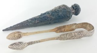 An Irish George IV silver pair of sugar tongs, hallmarked Dublin 1822, together with an elaborate