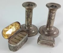 A pair of early 20th silver century candlesticks hallmarked Birmingham 1905, together with a