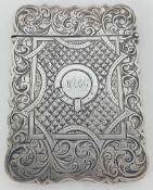 A Victorian silver card case, of engraved foliate decoration and monogrammed 'MABG', hallmarked