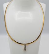 A five stone diamond pendant, set on a 14k yellow gold and silver, collar, approx 18g.