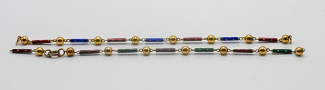 Two gold and enamel bracelets.
