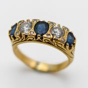 A diamond and sapphire five stone ring, set in 18k yellow gold, size M, approx 5.2g.