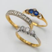 Two 18ct gold dress rings, approx 4.4g together with another diamond dress ring (not hallmarked),