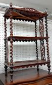 An antique oak gateleg table, with turned legs, together with a Victorian walnut two tier stand with