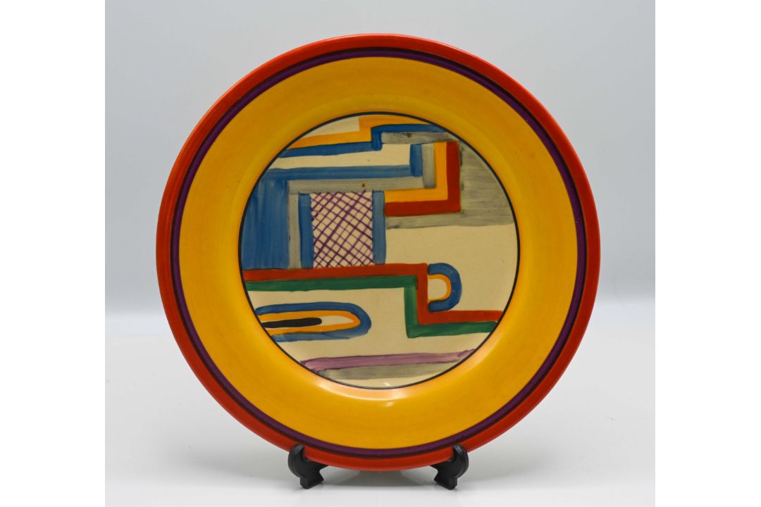 A Clarice Cliff red 'Tennis' plate. - Image 1 of 3