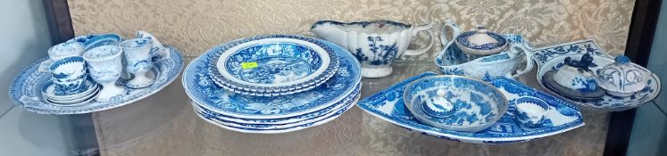 A collection of blue and white porcelain, to include miniature tea bowls and saucers marked to