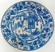 An 18th century tin-glazed earthenware large plate, with Chinese decoration.