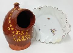 A 19th century large slipware salt pig, decorated in yellow glaze with 'J.S.I 1877', height 27cm,