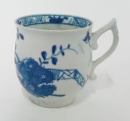 An 18th century porcelain teacup, possibly First Period Worcester, floral motif to exterior,