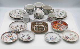 A set of four fluted ‘famille-rose’ teacups and saucers, early 19th century, decorated with
