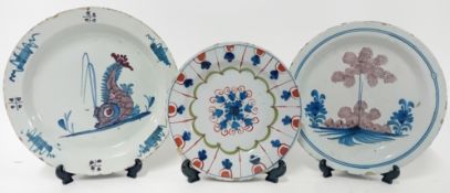 Three 18th century English Delftware plates, to include two of painted blue and sponged grey design,