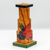 A Clarice Cliff stepped candlestick, in abstract orange 'Café Au Lait' fruit pattern, marked 'Café