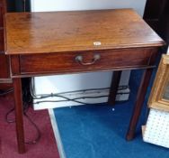 A Georgian mahogany side table fitted with a swinging door on square chamfer legs. Width 60cm.